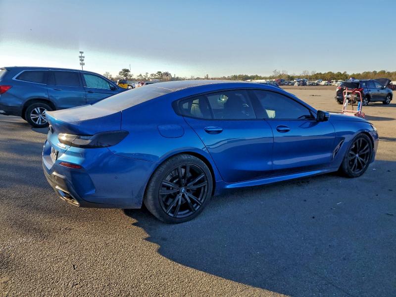 Photo 3 from auction – 2020 BMW M850XI with VIN WBAGV8C07LCE44957