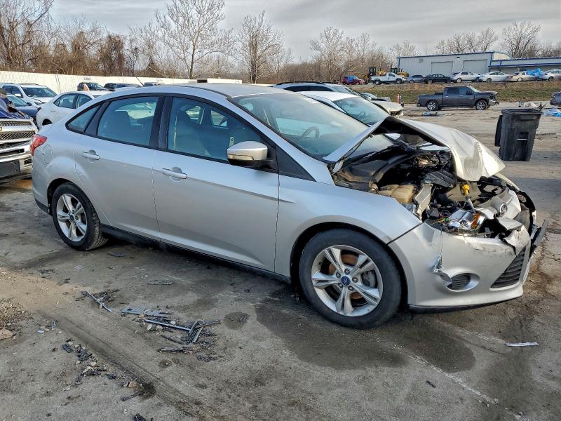 Photo 4 from auction – 2014 FORD FOCUS SE with VIN 1FADP3F20EL414656
