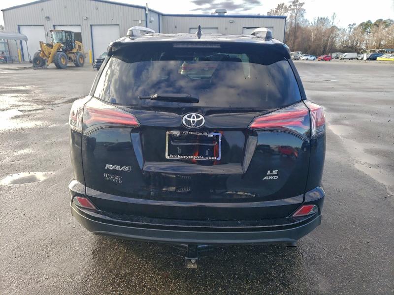 Photo 6 from auction – 2016 TOYOTA RAV4 with VIN 2T3BFREV8GW500977