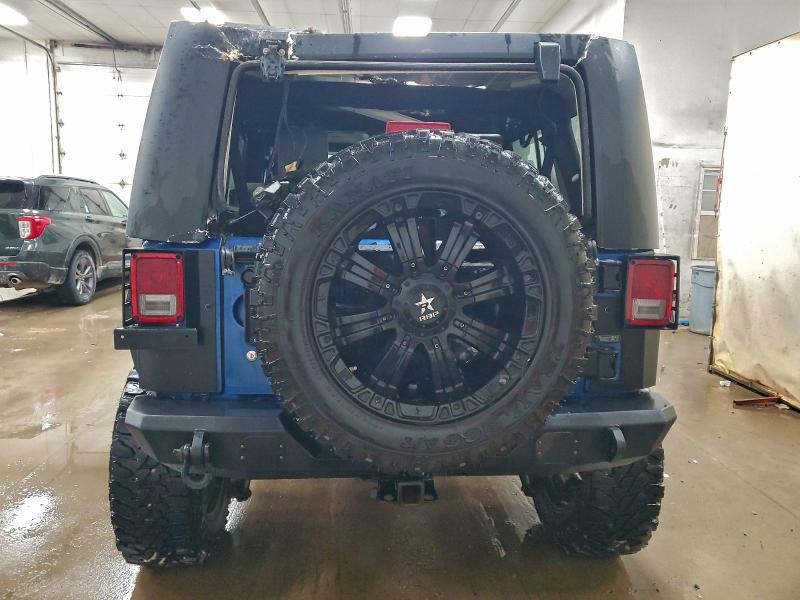 Photo 6 from auction – 2010 JEEP WRANGLER U with VIN 1J4BA3H19AL107241