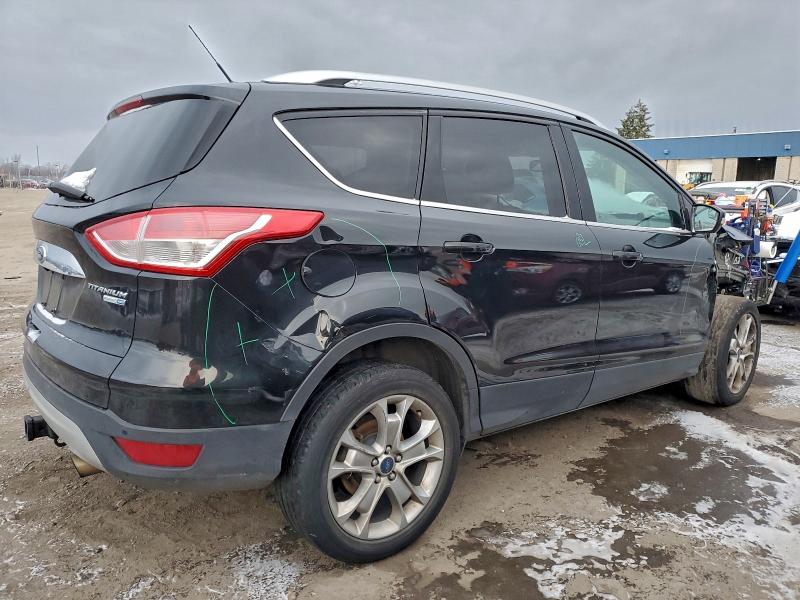 Photo 3 from auction – 2014 FORD ESCAPE TIT with VIN 1FMCU9J93EUD53721