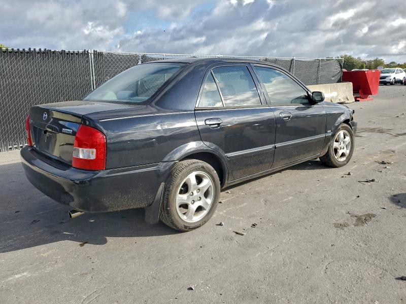 Photo 3 from auction – 1999 MAZDA PROTEGE ES with VIN JM1BJ2213X0107285