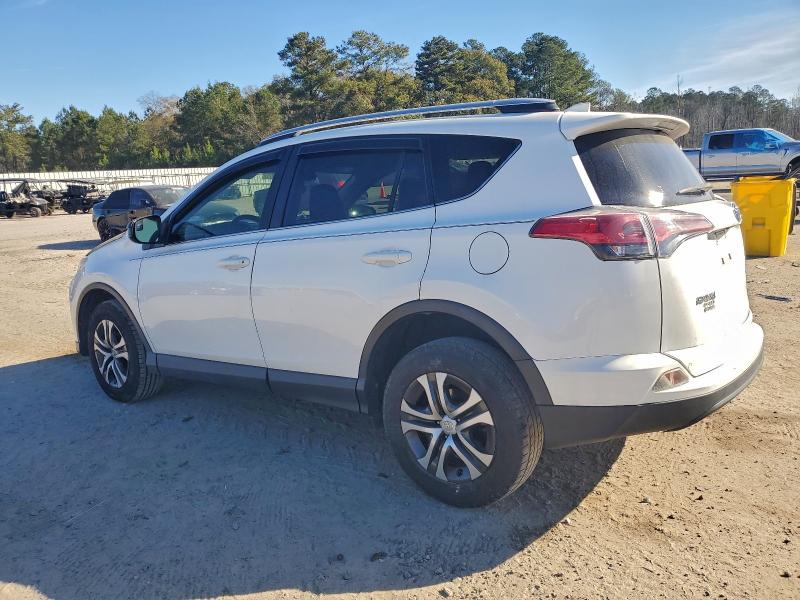 Photo 2 from auction – 2016 TOYOTA RAV4 LE with VIN JTMZFREV0GJ066759