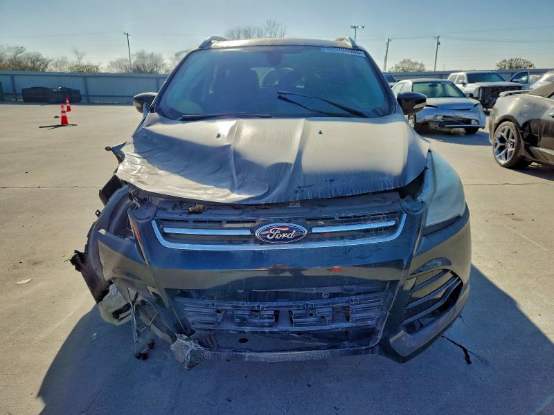 Photo 5 from auction – 2014 FORD ESCAPE TIT with VIN 1FMCU0J97EUE38721