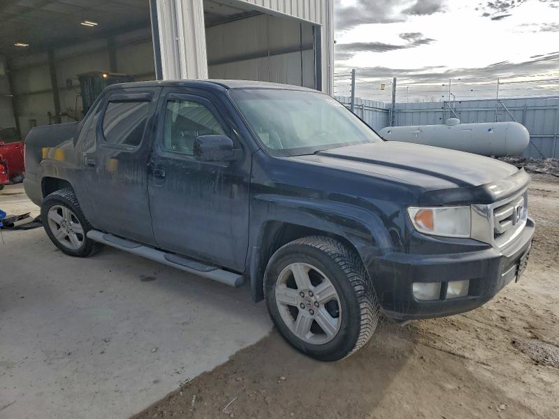 Photo 4 from auction – 2011 HONDA RIDGELINE with VIN 5FPYK1F50BB453939