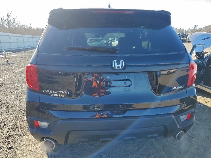 Photo 6 from auction – 2023 HONDA PASSPORT E with VIN 5FNYF8H52PB037885