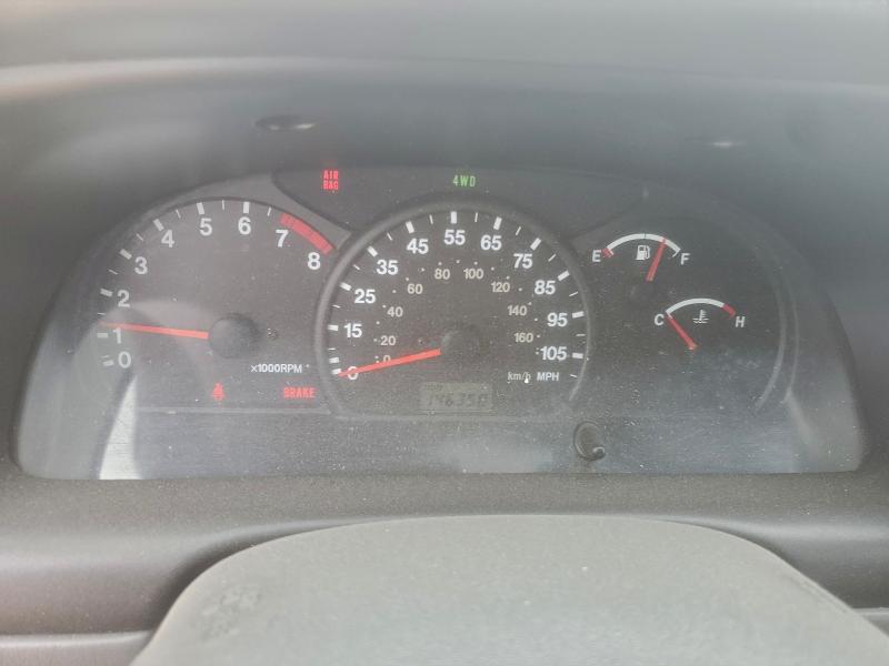 Photo 9 from auction – 2001 CHEVROLET TRACKER LT with VIN 2CNBJ634716915908