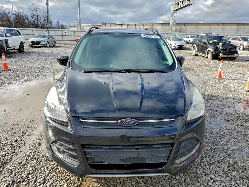 Photo 5 from auction – 2016 FORD ESCAPE SE with VIN 1FMCU9GXXGUA93410