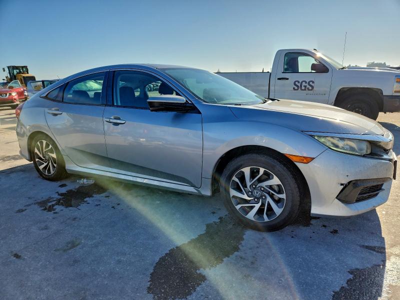 Photo 4 from auction – 2018 HONDA CIVIC EX with VIN 19XFC2F70JE023000