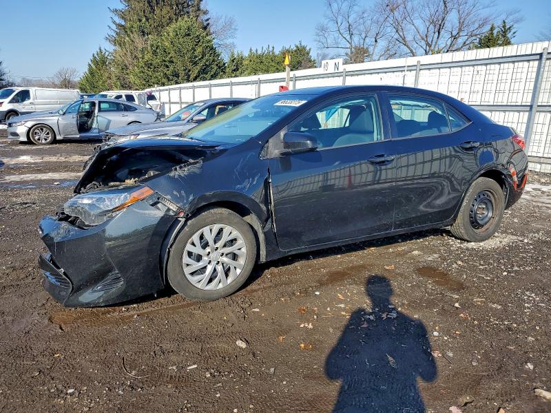 TOYOTA COROLLA 2017 with VIN 5YFBURHE5HP656648 - Photo from auction