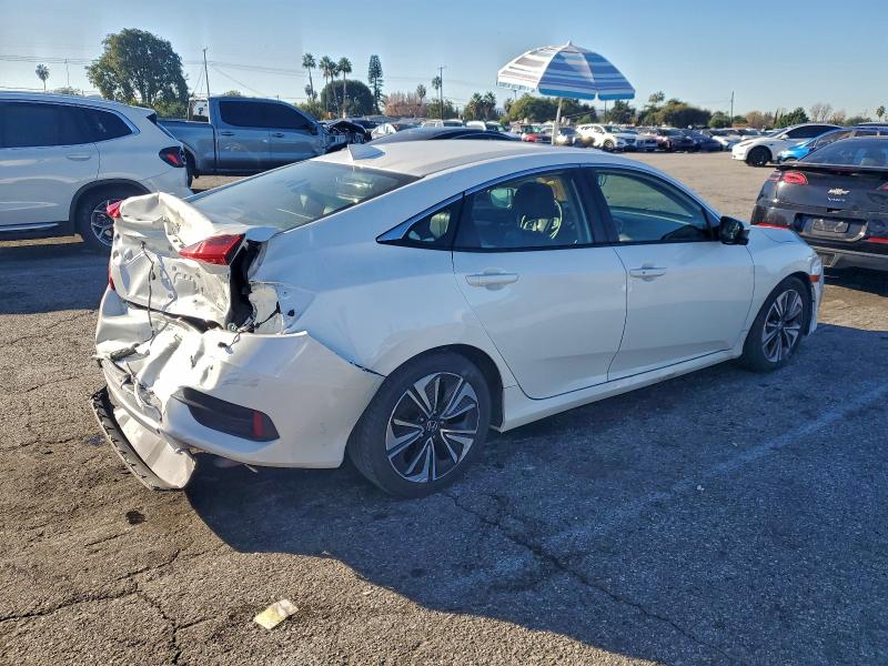 Photo 3 from auction – 2018 HONDA CIVIC EXL with VIN JHMFC1F79JX031816