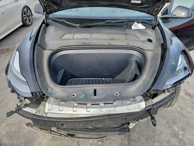 Photo 11 from auction – 2023 TESLA MODEL Y with VIN 7SAYGDEF2PF602061