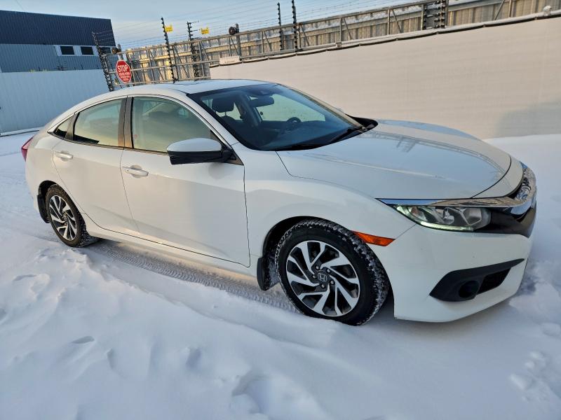 Photo 4 from auction – 2017 HONDA CIVIC EX with VIN 2HGFC2F83HH030337
