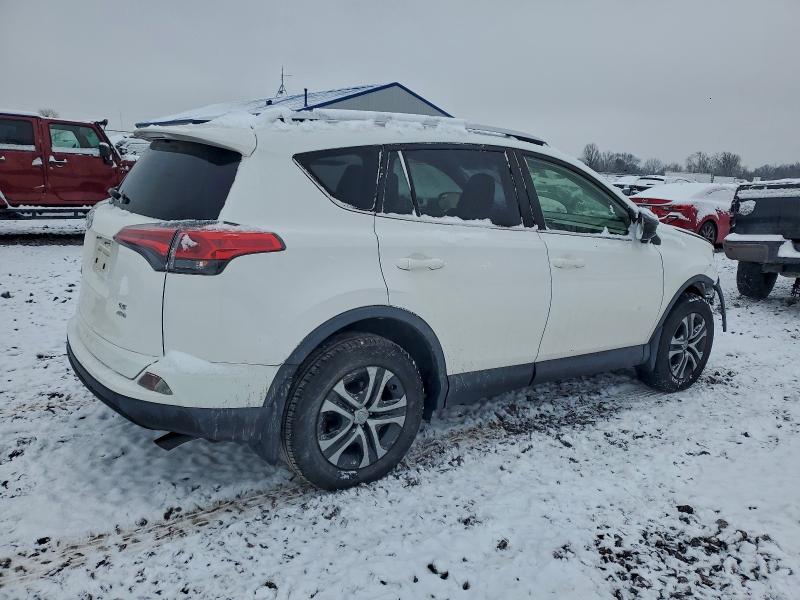 Photo 3 from auction – 2016 TOYOTA RAV4 LE with VIN JTMBFREVXGJ101020
