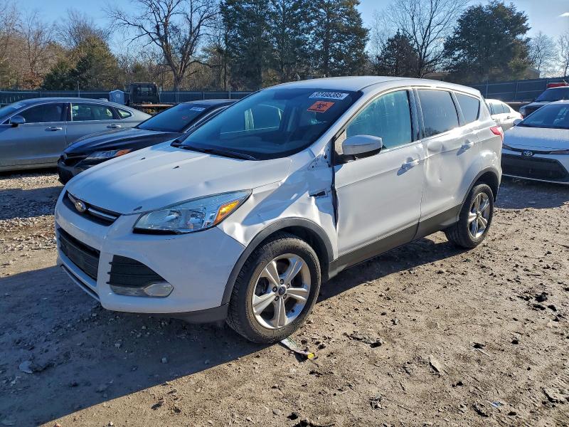 FORD ESCAPE SE 2016 with VIN 1FMCU9GX2GUC40402 - Photo from auction