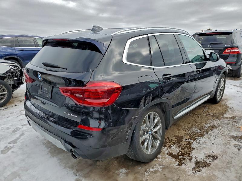 Photo 3 from auction – 2019 BMW X3 XDRIVE3 with VIN 5UXTR9C51KLE11537
