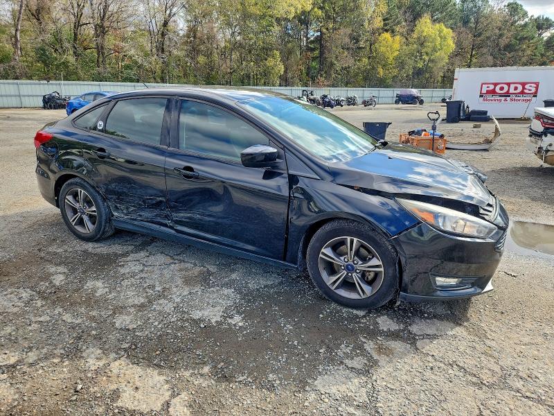 Photo 4 from auction – 2018 FORD FOCUS SE with VIN 1FADP3FE4JL210852