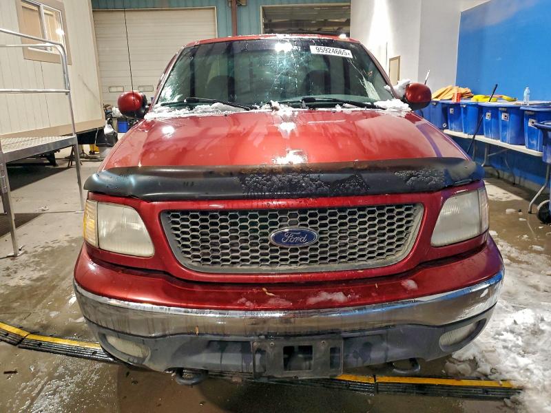 Photo 5 from auction – 2000 FORD F150 with VIN 1FTRX18L6YNA38578