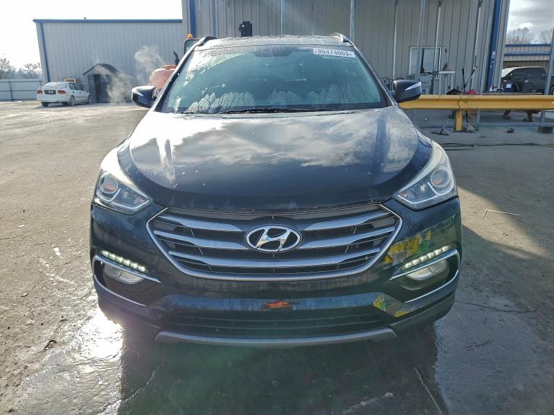 Photo 5 from auction – 2017 HYUNDAI SANTA FE S with VIN 5NMZU3LB6HH051668