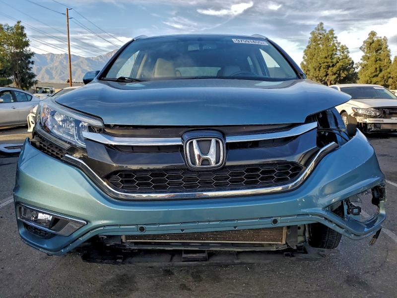 Photo 5 from auction – 2016 HONDA CR-V with VIN 2HKRM3H76GH561668