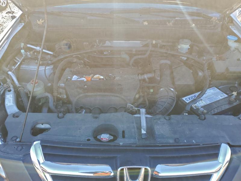 Photo 12 from auction – 2002 HONDA CR-V LX with VIN JHLRD78402C013606