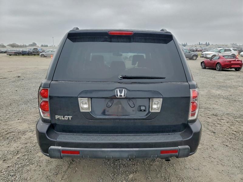 Photo 6 from auction – 2006 HONDA PILOT EX with VIN 5FNYF28726B050178