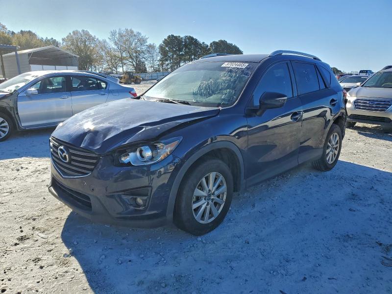 MAZDA CX-5 TOURI 2016 with VIN JM3KE2CY1G0616153 - Photo from auction