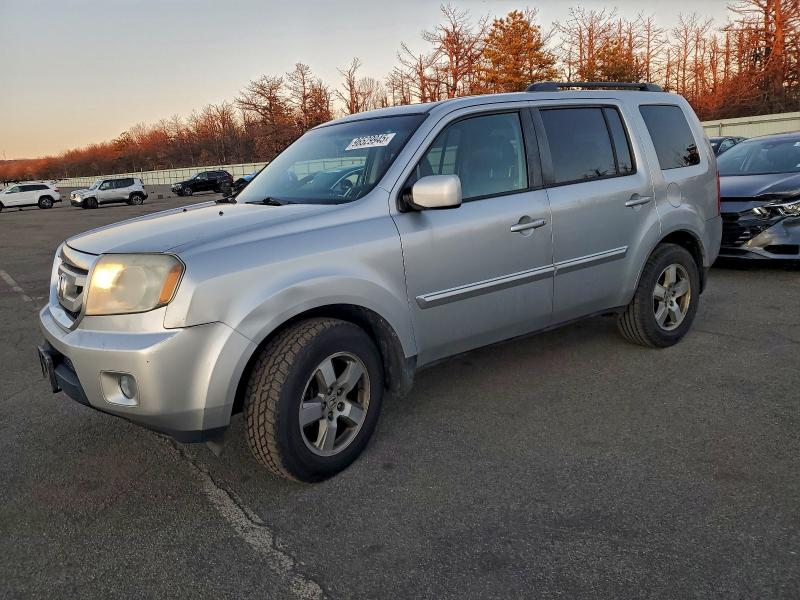 HONDA PILOT EXL 2011 with VIN 5FNYF4H51BB054338 - Photo from auction