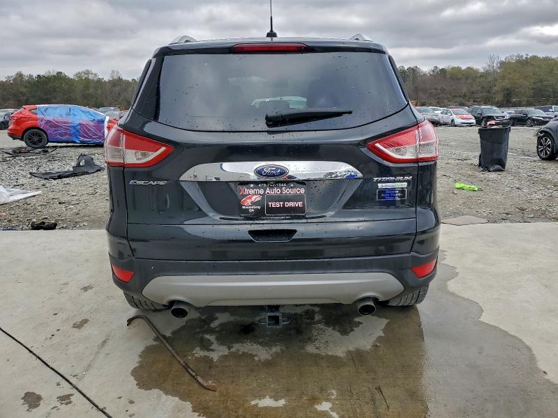 Photo 6 from auction – 2014 FORD ESCAPE TIT with VIN 1FMCU0J99EUB17490