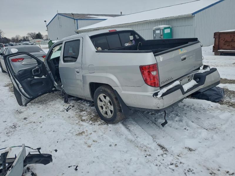 Photo 2 from auction – 2011 HONDA RIDGELINE with VIN 5FPYK1F4XBB454863