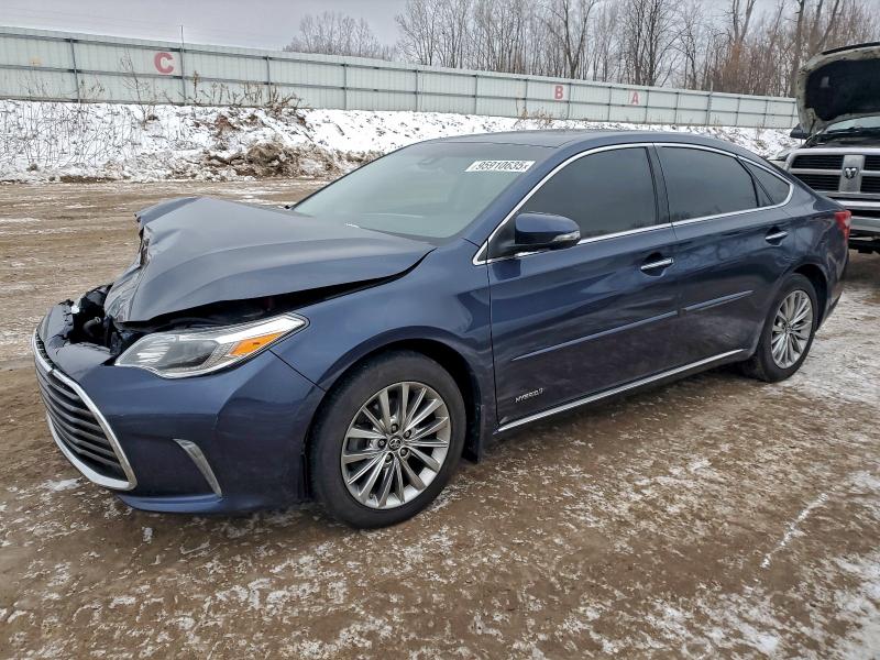 TOYOTA AVALON HYB 2018 with VIN 4T1BD1EB8JU059686 - Photo from auction