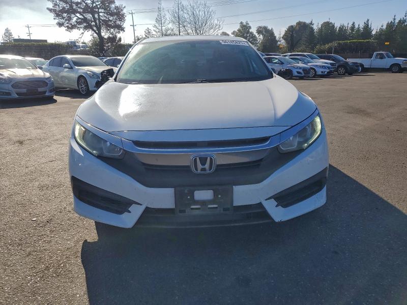 Photo 5 from auction – 2017 HONDA CIVIC EX with VIN 19XFC2F79HE220158