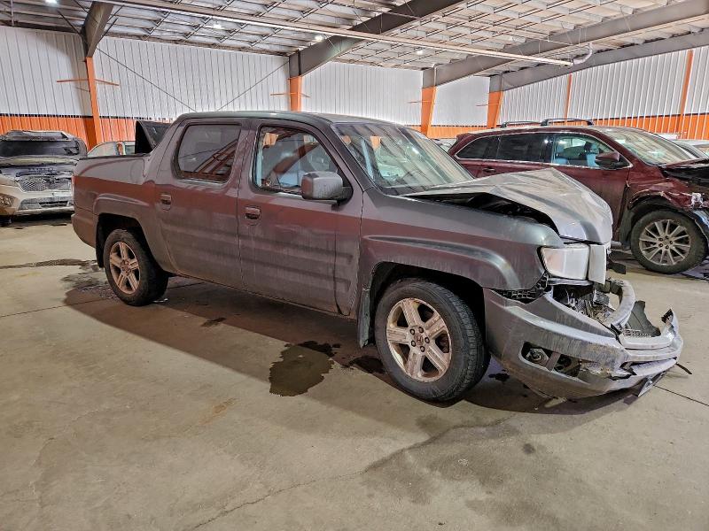 Photo 4 from auction – 2011 HONDA RIDGELINE with VIN 5FPYK1F54BB502995