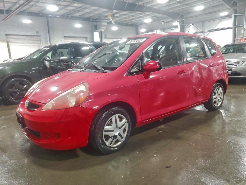 HONDA FIT 2007 with VIN JHMGD37407S003894 - Photo from auction