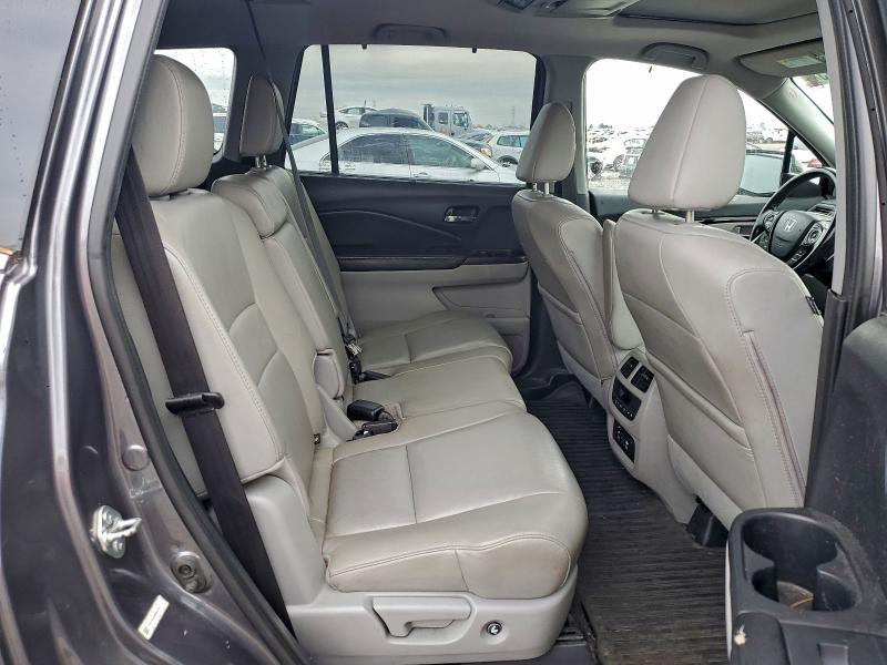 Photo 11 from auction – 2016 HONDA PILOT TOUR with VIN 5FNYF6H96GB022863