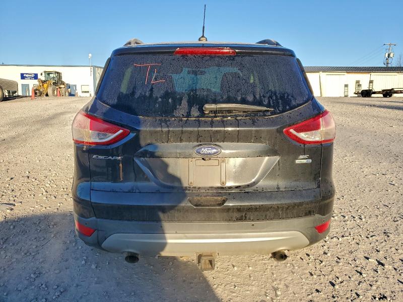 Photo 6 from auction – 2014 FORD ESCAPE SE with VIN 1FMCU9G97EUE32378