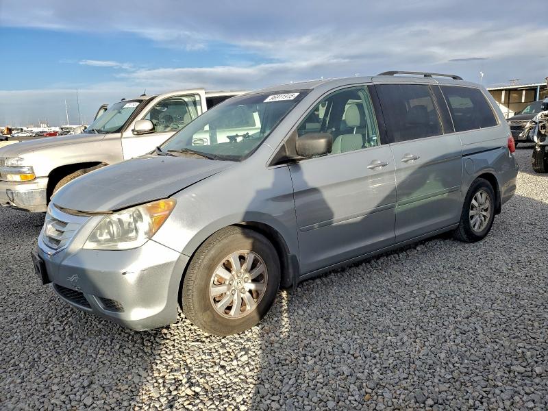 HONDA ODYSSEY EX 2010 with VIN 5FNRL3H75AB096986 - Photo from auction