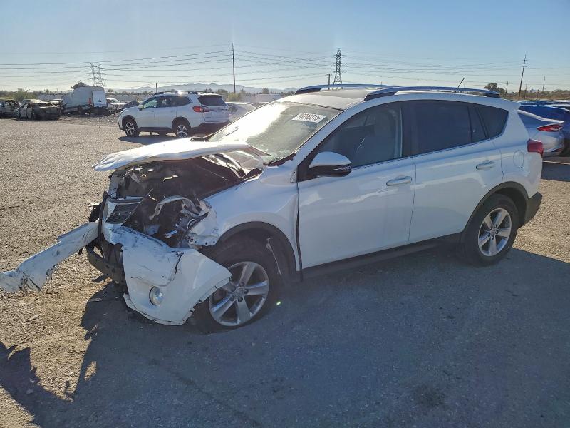 TOYOTA RAV4 XLE 2014 with VIN JTMRFREV4ED093541 - Photo from auction