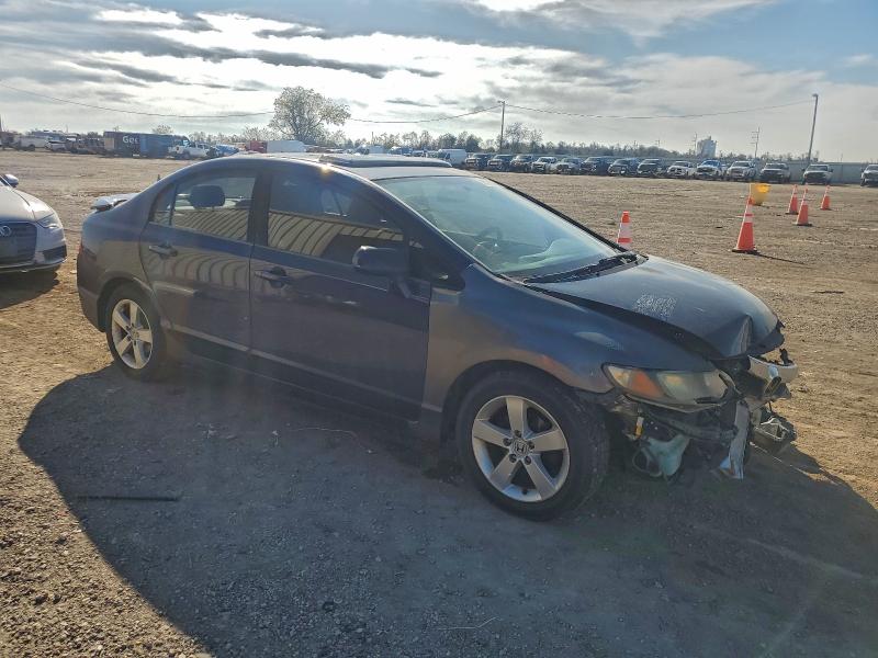 Photo 4 from auction – 2010 HONDA CIVIC EX with VIN 19XFA1F87AE055600