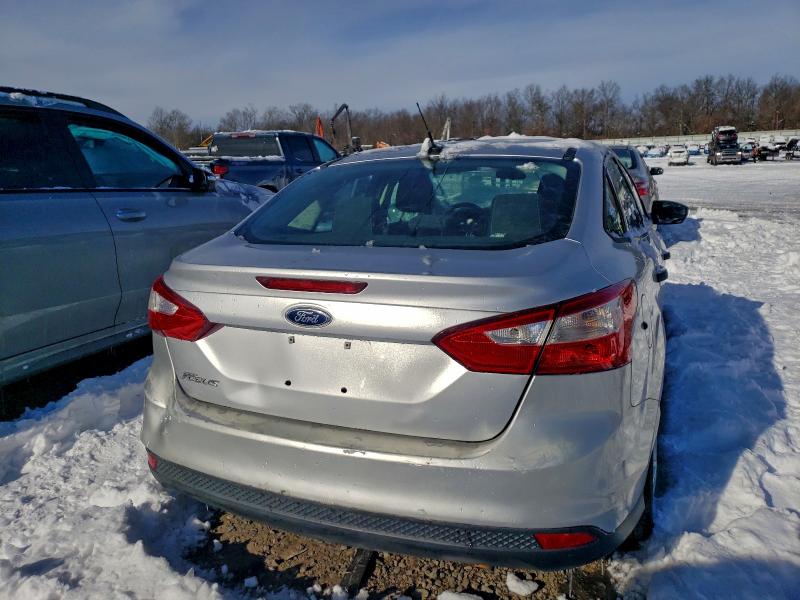 Photo 6 from auction – 2014 FORD FOCUS S with VIN 1FADP3E27EL114341