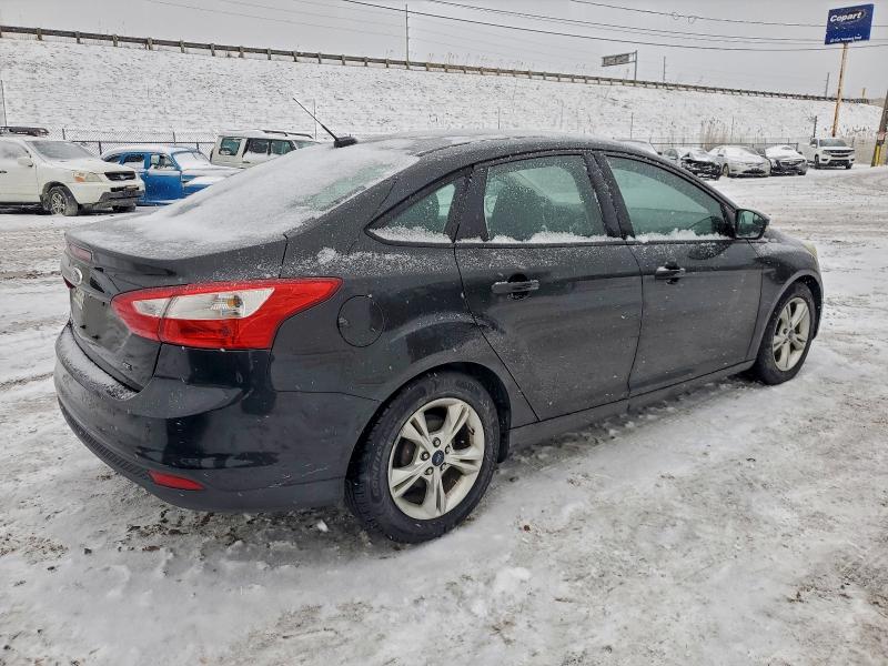 Foto 3 de la subasta – 2014 FORD FOCUS SE con VIN 1FADP3F26EL230631