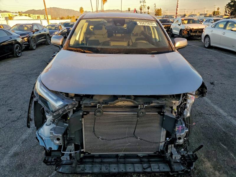 Photo 5 from auction – 2023 TOYOTA RAV4 LE with VIN 2T3K1RFV6PC242585