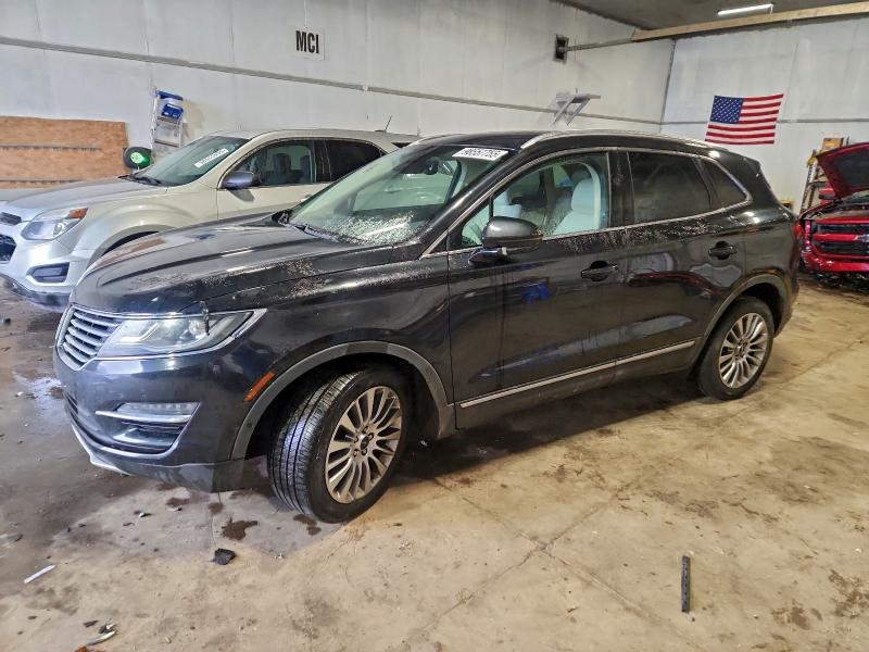 LINCOLN MKC 2015 with VIN 5LMTJ2AH2FUJ20340 - Photo from auction
