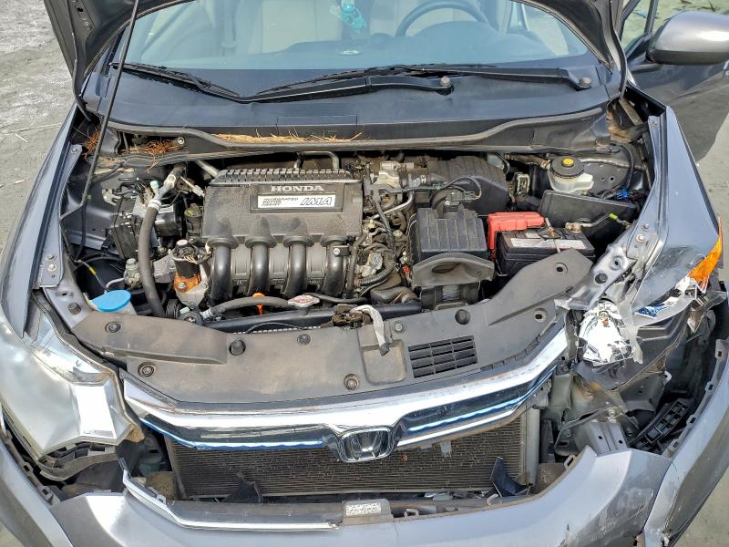 Photo 11 from auction – 2013 HONDA INSIGHT LX with VIN JHMZE2H56DS000985