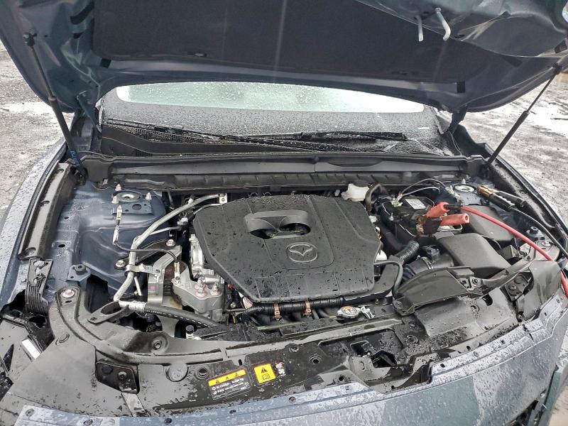 Photo 12 from auction – 2025 MAZDA CX-50 with VIN 7MMVABDM0SN351704