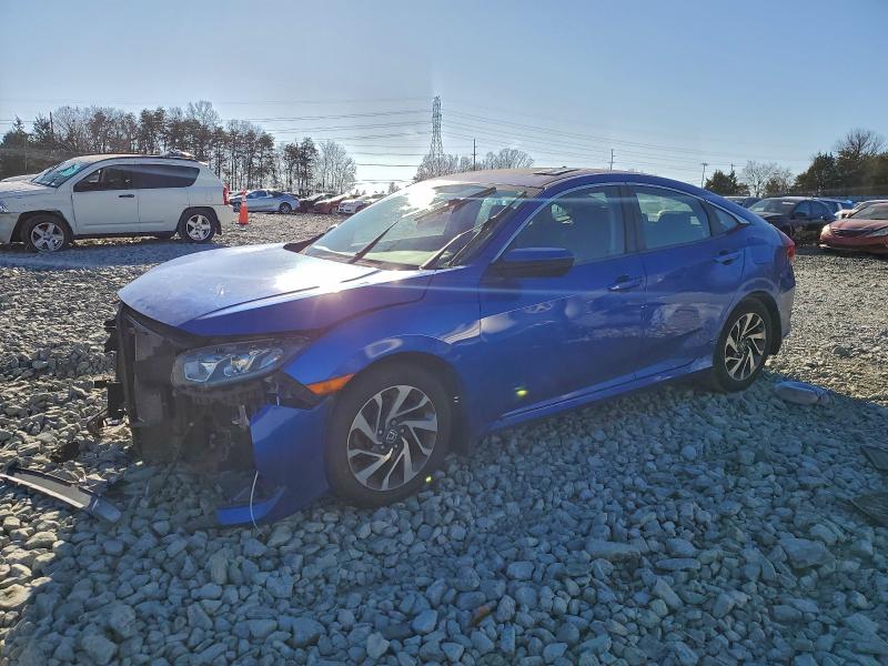 HONDA CIVIC EX 2017 with VIN 2HGFC2F71HH568171 - Photo from auction