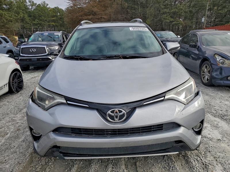 Photo 5 from auction – 2016 TOYOTA RAV4 XLE with VIN 2T3WFREV7GW299350