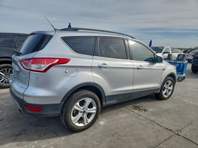 Photo 3 from auction – 2016 FORD ESCAPE SE with VIN 1FMCU0GX9GUC57418