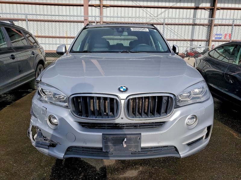 Photo 5 from auction – 2015 BMW X5 XDRIVE3 with VIN 5UXKS4C58F0N09844