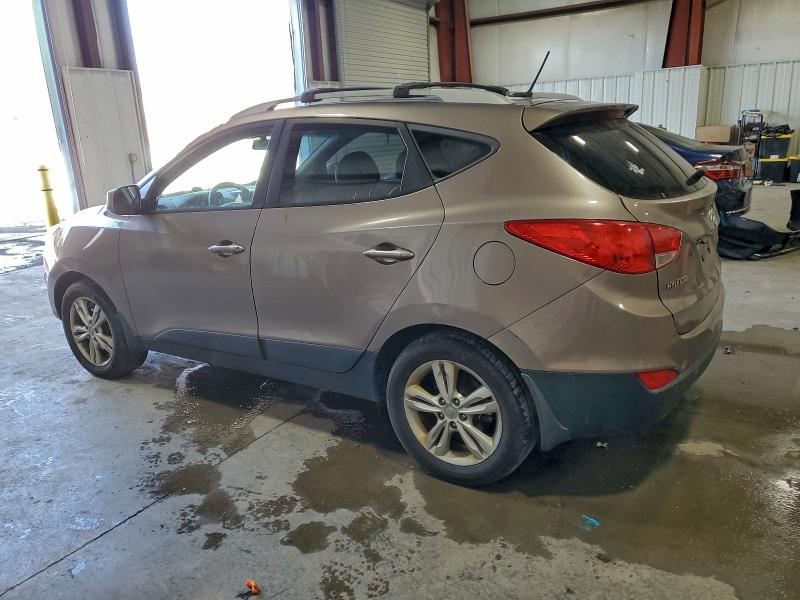 Photo 2 from auction – 2011 HYUNDAI TUCSON GLS with VIN KM8JUCAC8BU186509